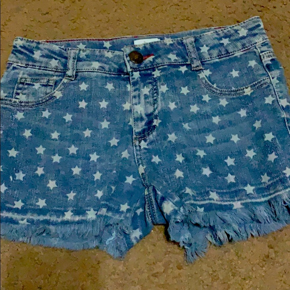 Jean shorts with bleach stars